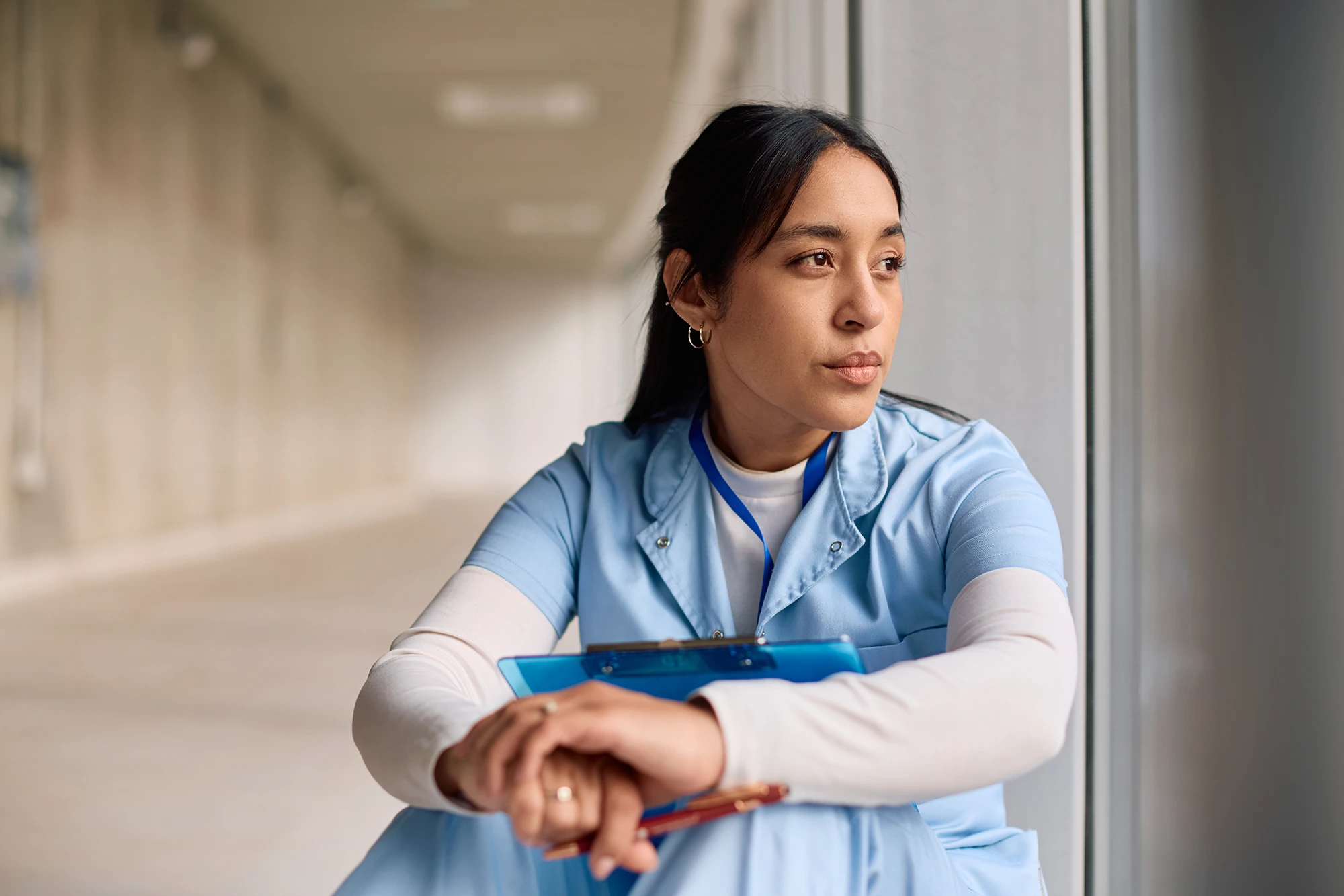 medical professional thinking about job legal problems